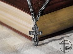 "On the front side of the 925 silver greek orthodox cross there is an image of the crucifix of Jesus Christ surrounded by saints. At the bottom of the cross necklace is the inscription \"NIKA\". On the reverse of the cross is the inscription \"Save and Preserve 2000 years\" (2000 years from the date of the Christianization of Rus). Christogram (chrismon) is depicted in a small circle under the inscription. It is a chi rho - monogram of Christ consisting of 2 Greek letters X and P. The letters of Byzantine Cross Necklace With Engraving, Spiritual Hallmarked Crucifix Jewelry And Charms, Byzantine Crucifix Necklace As A Gift, Engraved Spiritual Cross Jewelry And Charms, Engraved Spiritual Cross Charms And Jewelry, Greek Orthodox Cross, Alpha And Omega, Chi Rho, Orthodox Cross