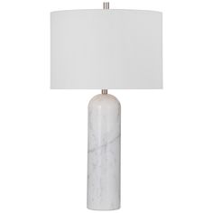 a marble lamp with a white shade on it