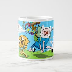 an adventure time cartoon mug with finn and finn running on the grass in front of other characters