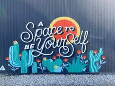 a mural on the side of a building that says, a space to be yourself