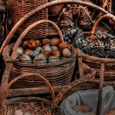 baskets filled with fruit sitting on top of hay