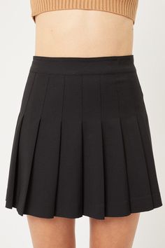 Zip Back Pleated Skirt FABRIC & FIT 95% Polyester 5% Spandex Model is wearing a size small Heathers Costume, Black Tennis Skirt, School Skirt, Beachy Style, Printed Pleated Skirt, Black Pleated Skirt, Tennis Skirts, Hipster Outfits, Stretch Crepe