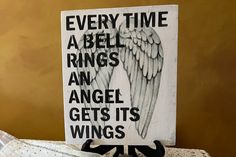 a sign that says every time a bell rings an angel gets its wings