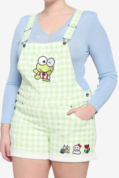 Hop around with Keroppi in style in these lime green gingham shortalls! They come cuffed and feature an embroidery of Keroppi winking on the chest pocket, with embroideries on the thigh of Den Den, Teru Teru and a red tulip. Comes with adjustable straps, hip and back pockets and side button closures. Green Overall Dress Plus Size, Kerropi Sweater, Real Plus Size Women, Froggy Overalls, Plus Size Kidcore, Keroppi Merch, Cute Pastel Clothes, Colourful Fits, Den Den