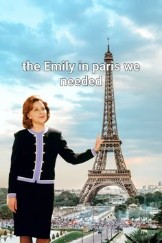 a woman standing in front of the eiffel tower with her hand out to someone