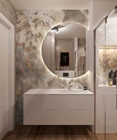 a bathroom with a sink, mirror and bathtub in the middle of the room