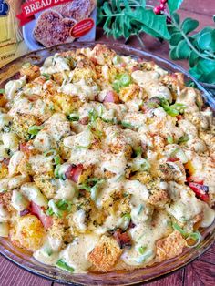 a pizza sitting on top of a pan covered in cheese and veggie toppings