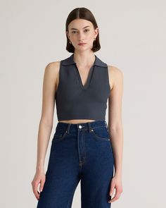 It’s giving preppy chic. Our Cropped Polo Ribbed Knit Tank has structured style and a textured-yet-soft feel. We love the contemporary cropped fit and subtle collar. Also available in Halter, Square Neck, Mock Neck, and One Shoulder silhouettes.  | Quince | Women's Cropped Polo Ribbed Knit Tank Top in Grey, Size Small, Recycled nylon/polyester/spandex Classic Cropped Crop Top, Chic Knit Top For Work With Seamless Collar, Solid Color Cropped Knit Top, Chic Solid Color Cropped Knit Top, Chic Cropped Knit Top, Trendy Cropped Tops With Ribbed Collar, Chic Cropped Textured Knit Top, Chic Textured Knit Crop Top, Ribbed Knit Tank Top