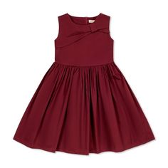 Our festive party dress will have your girl holiday-ready in no time! Cut from soft organic cotton sateen, this perfect piece features a sophisticated fit and flare shape, asymmetrical bow detail at the neckline, and a zipper down the center back for easy dressing. Holiday season, here she comes! Toddler Dress Burgundy, Baby Girl Maroon Dress, Toddler Red Christmas Dress, Girls Valentine Dresses, Toddler Red Floral Dress, Girl Holiday, Bow Party, Big Girl Dresses, Cord Dress