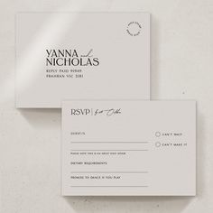 two white business cards on top of each other with the words, vanilla nicholas written in black