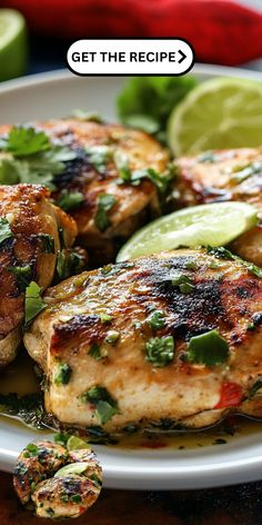 grilled chicken with limes and cilantro garnish on a white plate