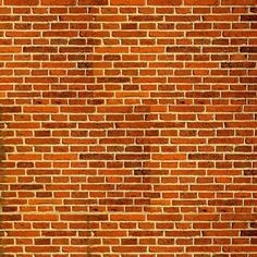 a red brick wall is shown in this image