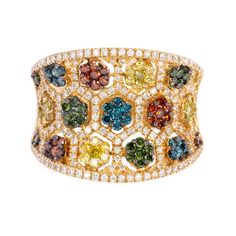 14k yellow gold diamond and multi-colored sapphire ring with 158 round brilliant cut diamonds weighing .44 carats total of F color, VS2 clarity. Ring also features multi-colored sapphires weighing .92 carats of excellent cut, hue, and even color distribution. Ring size 7. Colored Sapphires, Right Hand Rings, Ring Size 7, Round Brilliant Cut Diamond, Brilliant Cut Diamond, Round Brilliant, Multi Colored, Sapphire Ring, Gold Diamond