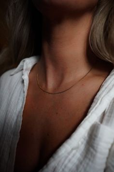 Model wearing INDIVIJWL 16-inch dainty gold box chain necklace, featuring a delicate 24k gold-filled design. Perfect for a minimalist, elegant jewelry style. Everyday Curb Chain Charm Necklace, Everyday Minimalist Necklace With Curb Chain, Minimalist Necklace With Curb Chain For Gifts, Dainty Charm Necklaces With Curb Chain For Gifts, Minimalist Curb Chain Necklace As Gift, Dainty Curb Chain Necklace Gift, Simple Gold Chain Necklace For Everyday, Delicate Box Chain Necklace As Gift, Delicate Box Chain Necklace For Gift