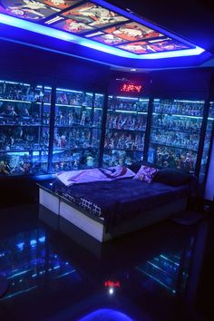 a bed in the middle of a room with many lights