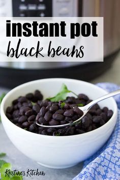 instant pot black beans in a white bowl with a spoon