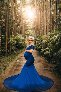 Our Athena Gown is one of our most loved maternity photoshoot gowns! It's a convertible style which you can wear either fitted mermaid, or pull the skirt up for a more flowy look!The suggested size range for our Athena gown is: 4-12 (if made in our Luxe Jersey Fabric) 4-14 (if made in our Signature stretch Fabric) Shop more Chicaboo Athena Gowns in another color?Shop more Chicaboo gowns by size.Shop more Chicaboo gowns by name.Not sure which material to choose? Read about our Materials & Fab Blue Maternity Dress Photo Shoot, Prego Photoshoot, Royal Blue Maternity Dress, Maternity Gowns For Photoshoot, Maternity Photoshoot Dress, Maternity Picture Outfits, Blue Maternity Dress, Cute Maternity Dresses, Couple Pregnancy Photoshoot