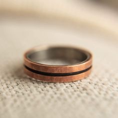 a close up of a wedding ring on a cloth