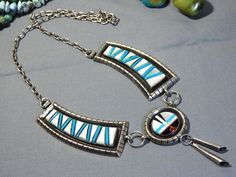 Item Details Vintage hand crafted Native American silver art. Photos are part of the description. Listing is for necklace only. Unsigned. Guaranteed all silver is solid sterling silver. Genuine Sleeping Beauty Turquoise,  Coral, Onyx & Mother Of Pearl. The necklace measures 20" end to end. The center focal hangs 2&1/2" & is 1&1/8" across at Sunface without rings. Each side bar measures 3&7/8" x 1". Sterling silver hook and eye clasp. Weighs 60 grams. Thank you for stopping by 😊❗ Southwestern Silver Turquoise Inlay Necklace, Sleeping Beauty Turquoise Necklace, Southwestern Sterling Silver Multi-stone Necklace, Blue Southwestern Hand-strung Necklaces, Southwestern Style Blue Turquoise Nickel-free Necklace, Sleeping Beauty Turquoise, Silver Art, Mother Of Pearl, Sleeping Beauty