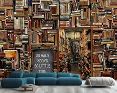 a room filled with lots of books and a chalkboard on the wall that says so many books, so little time