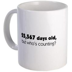 a white coffee mug with the words 957 days old, but who's counting?