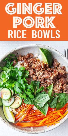 a white bowl filled with rice, carrots and cucumber on top of a table