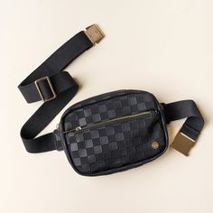 Make a statement- wear it two ways- across the chest or around your waist.Printed wipeable lining 2 exterior pocketsGold zipper and hardware100% vegan leather Cotton strap with gold buckleLength of strap fully extended: 46” Dimensions: 9” x 6” x 2” Black Travel Belt Bag With Gold-tone Hardware, Black Belt Bag With Gold-tone Hardware For Travel, Summer Smell, Toddler Girl Toys, Denim Sweater, Perfume Gift Sets, Jumpsuit Jacket, Perfume Gift, Grad Gifts