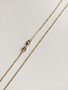 "18K GOLD FILLED CROSS NECKLACE . FOR GOOD LUCK,PROTECTION,HEALTH AND ANY KIND OF DIFFICULTY .18\" LONG CHAIN. PENDANT SIZE: 40 X 18 mm 18K GOLD FILLED CADENA DE CRUZ . PARA PROTECCION,BUENA SUERTE,SALUD Y PARA CUALQUIER CASO DIFICIL.18\" LARGO CADENA. TAMANO DEL DIJE: 40 X 18 mm" Adjustable Gold Necklace With Curb Chain, 14k Gold-filled Figaro Chain Necklace As Gift, Gold Charm Necklace With Figaro Chain In 14k Gold, 14k Gold-filled Jewelry With Figaro Chain, Gold 14k Gold-filled Curb Chain Jewelry, 14k Gold Figaro Chain Pendant Necklace, Dainty 14k Gold Figaro Chain Necklace, 14k Gold-filled Charm Necklaces With Figaro Chain, 14k Gold-filled Charm Necklace With Figaro Chain