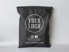 a black bag with the words your logo printed on it is sitting against a white background