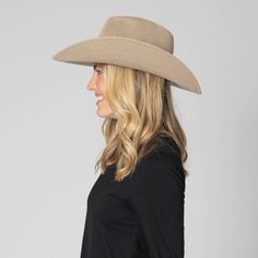 Elevate your style with Norma, a sophisticated cowboy hat featuring a pinch crown and a 3.75" brim. The luxurious faux leather linked band adds a touch of exclusivity. Made with 100% polyester, it's also adjustable for a perfect fit. Available in the elegant color of taupe. Features: Color: Taupe Material: 100% Polyester Size: 57cm Brim Size: 3.75" Pinch Crown Cowboy Hat Faux Leather Linked Band Adjustable Adjustable Wide Brim Felt Hat For Western-themed Events, Adjustable Wide Brim Felt Hat For Rodeo, Adjustable Wide Brim Felt Hat For Country Events, Adjustable Wide Brim Fedora For Rodeo, Rigid Curved Brim Hat For Western-themed Events, Rigid Hat With Curved Brim For Western-themed Events, Adjustable Western Hat Bands For Fall, Adjustable Felt Hat With Curved Brim For Western-themed Events, Western Brimmed Hat