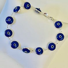 Pulsera, Plata 925 Ojo Del Mal Color Azul/Bracelet, Silver 925 Evil Eye Color Blue Handmade Sterling Silver Blue Evil Eye Bracelet, Handmade Blue Evil Eye Bracelet In Sterling Silver, Handmade Blue Sterling Silver Evil Eye Bracelet, Blue Sterling Silver Bracelets, Blue Sterling Silver Round Bracelets, Blue Bracelet 925 Silver As A Gift, Nickel-free Blue Sterling Silver Bracelet As A Gift, Adjustable Blue Sterling Silver Nickel-free Bracelet, Blue Sterling Silver Bracelet As Gift