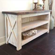 a wooden table sitting on top of a hard wood floor