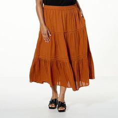 Antthony Tiered Skirt with Pockets  A tiered maxi skirt is a true staple of chic, laid-back summer style — Antthony's textured cotton dobby version is a breezy piece that will make every outfit feel vacation-ready. Casual Tiered Maxi Skirt For Beach, Spring Brown Cotton Maxi Skirt, Brown Cotton Maxi Skirt For Spring, Tiered Bottoms For Summer, Cotton Brown Maxi Skirt For Spring, Casual Tiered Maxi Skirt For Day Out, Solid Color Tiered Bottoms For Summer, Casual Solid Color Tiered Skirt, Solid Color Tiered Maxi Skirt For Day Out