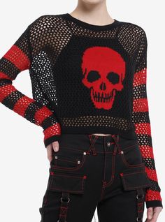 Add something killer to your wardrobe! This open knit sweater has red & black stripes down the sleeves and a red skull knit in the center.Please note: Cami not included.100% acrylicWash cold; dry lowLength: 20"Slight stretchSkimmer lengthImportedListed in junior sizesModel is 5'10"Model wears size Small Punk Clothing Women, Emo Alternative Outfits, Social Collision Clothes, Skull Sweater Outfit, Horrorcore Outfits, Gore Clothes, Alt Winter Fashion, Crochet Skull Sweater, Black And Red Clothes