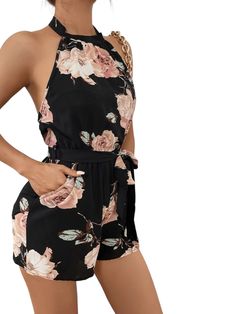 This Floral Backless Belted Romper is a stylish and versatile addition to your wardrobe. Featuring an all-over floral pattern in black, this boho-inspired romper is perfect for any occasion. The belted waistline cinches in your curves, while the tie-back and pocket details give it a modern edge. Made from lightweight polyester fabric with non-stretch properties, this piece will keep you comfortable all day long without compromising on style. Plus, with its easy care instructions, you can machine wash or dry clean this romper with ease. Add a touch of fun to your outfit with this Floral Backless Belted Romper! Features: Color: Black Style: Boho Pattern Type: Floral Details: Belted, Backless, Pocket, Tie Back Length: Short Type: Cami Fit Type: Regular Fit Neckline: Halter Sleeve Length: Slee Summer Vacation Jumpsuits And Rompers With Belt, Casual Black Floral Jumpsuits And Rompers, Bohemian Floral Print Jumpsuits And Rompers For Day Out, Black Bohemian Jumpsuit For Vacation, Chic Floral Print Beach Jumpsuit, Chic Floral Print Summer Jumpsuits And Rompers, Chic Beach Jumpsuit With Floral Print, Chic Summer Floral Jumpsuits And Rompers, Chic Floral Print Jumpsuits And Rompers For Beach