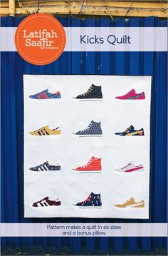 a quilted wall hanging on the side of a building with lots of shoes in it