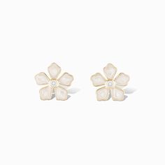 Embrace a touch of femininity with our dainty Maggie Stud earrings. Designed in a charming floral shape with a soft, pearlescent finish and a pop of color at the center, these earrings add a subtle yet elegant accent to any look. Perfect for all-day wear, they bring a light and graceful vibe, making them a versatile choice for casual and sophisticated styles alike. Let the Maggie studs add a delicate, floral touch to your collection. Details Lightweight stud earrings Made of genuine cubic zircon Luxury Feminine Flower Earrings For Women, Luxury Dainty Flower Earrings, Luxury Earrings, Dainty Studs, Stylish Clothes For Women, Flower Studs, Stone Settings, Sophisticated Style, Earrings For Women