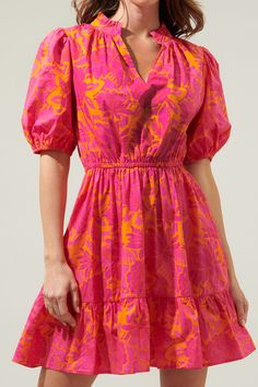 Fun & Floral! This tropical mini poplin dress is perfect for your next vacation or sunny day outfit. The v-neck design adds a touch of elegance to the dress, while the elastic waist adds on some extra personality. Pair it with your favorite heels or sandals to complete the look.- Split neck- Puff sleeves- Poplin- E Sunny Day Outfit, Maxi Dress Designs, Style Guru, Poplin Dress, Day Outfit, Blouse Dress, Orange Pink, Cotton Style, Color Orange