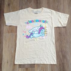 Size: S Shoulder To Hem: 26.5" Pit To Pit: 17.5" Condition: Nwot, No Rips, No Stains, From Smoke Free Home. Flat Lay Measurements. Ships Within 24 Hrs Except Weekends! I Love Offers! Cute Cream Cotton T-shirt, Cute Cream Short Sleeve T-shirt, Sanrio Shirts, Flat Lay, Graphic T Shirt, Graphic Tshirt, Tee Shirts, Mens Shirts, Man Shop