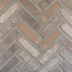 an image of a brick sidewalk that looks like it is made out of bricks