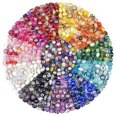 many different colored beads arranged in a circle