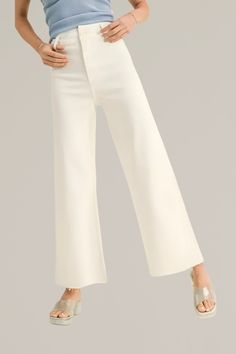 upgrade your casual wardrobe with these zara-dupe, cream wide-leg cut-off denim pants, a versatile blend of comfort and contemporary style. crafted from premium denim with stretch, these pants feature a flattering high-rise waist and a wide-leg silhouette that offers a relaxed, yet chic look. pairs effortlessly with both casual tees and dressier tops. finished with a cut-off hem for a modern edge, these pants are ideal for creating effortless day-to-night outfits. 98% cotton | 2% spandex back po