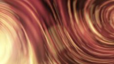 a blurry image of red and yellow swirls