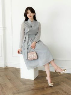 This is a Korean Modern Hanbok Wrap Style Dress for Women. This hanbok is modernly designed so you can wear it comfortably and beautifully. This modern hanbok is perfect dress for daily and special celebrations such as parties or various events. 📐Model size Height 5.57ft(170cm) Waist circumference 26in(66cm) Wearing a size F ⭐Please check out the link below for the see through cover skirt the model in the photo is wearing. https://www.etsy.com/listing/1311197605/ ⭐Decorate more stylishly with accessories that go well with Hanbok. 🟠 Go look hanbok accessories: https://www.etsy.com/shop/LunarJogak?ref=seller-platform-mcnav&section_id=33148097 🟠 Go look hanbok hair accessories: https://www.etsy.com/shop/LunarJogak?ref=seller-platform-mcnav&section_id=33326881 The color of the clothes may l Hanbok Dress Modern, Style Dress Korea, Hanbok Women, Hanbok Accessories, Hanbok Hair, Modern Hanbok Dress, Hanbok Dress, Dress Korea, Modern Hanbok