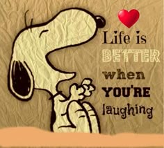 a snoopy cartoon character with the words life is better when you're laughing