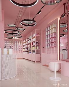 a pink and white store with lots of shelves