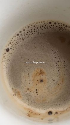 a cup of coffee with the words cup of happiness written on it