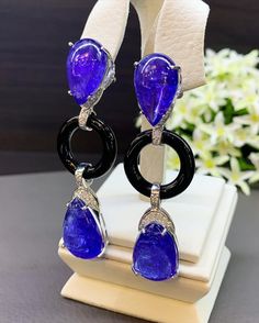 ONE OF A KIND HANDCRAFTED EARRINGS. IN STOCK! READY FOR SHIPPING! GIFT WRAP AVAILABLE! FREE UPS EXPRESS! MAJESTIC! Enormous Tanzanites in pairs! Extremely rare! Wear these earrings to a party and everyone will not be able to take their eyes off! So huge and so vivid blue. STUNNING 59.34TCW, Certified TANZANITE and diamond chandelier earrings. UNIQUE DESIGN! ONE OF A KIND! TRANSPARENT, LARGE, SPARKLING GEMSTONES IN PAIRS! Extremely rare! Surrounded by TOP GRADE, F/VS DIAMONDS! Set in 18K solid wh Luxury Tanzanite Earrings, Luxury Sapphire Drop Jewelry, Formal Drop Cabochon Earrings, Luxury Tanzanite Pear-shaped Jewelry, Luxury Pear-shaped Tanzanite Jewelry, Diamond Chandelier Earrings, Diamond Chandelier, Golden South Sea Pearls, Vs Diamond