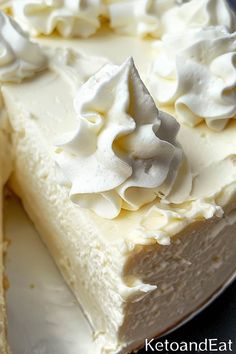 a piece of cake with white frosting on top