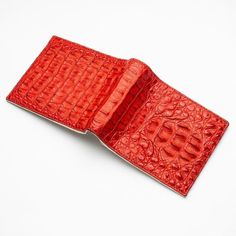 Red Genuine Crocodile Hornback Skin Leather Men's Wallet New   Genuine crocodile hornback skin    Internal layout: 2 ID Slots, 10 Credit Card Slots and 2 Bill Slots    Wallet measures: 4 1/2" x 3 5/8"      Take a step away from the norm and embrace beauty with our Red Genuine Crocodile Hornback Skin Leather Men's Wallet. It uses high-grade materials throughout, including striking crocodile leather which is admired for its unique pattern.       Our skilled craftsmen stitch and cut the leather dow Men's Wallet, Crocodile Leather, Leather Wallet Mens, Wallet Men, Unique Patterns, High Grade, Card Slots, Slots, Credit Card